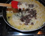 A picture of step 10 of Venison sausages risotto.