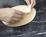 A picture of step 5 of Dosti roti.