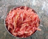 A picture of step 1 of Gajar ka halwa.