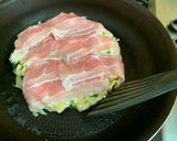 A picture of step 5 of Okonomi Yaki.