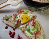 A picture of step 5 of Egg Pan Pizza#worldwideeggs.