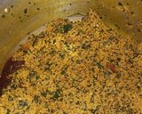 A picture of step 11 of Egusi soup with ugu and bitter leaf.