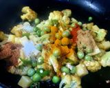 A picture of step 1 of Cauliflower Potato Peas Dry Vegetable or Sabzi.
