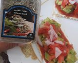 A picture of step 5 of #GA4 WEEK10 Sky flake cracker topped with cream cheese & avocado.