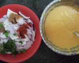 A picture of step 2 of Kanda Bhaji.