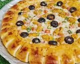 A picture of step 6 of Cheesy Bites Tikka Pizza 🍕🍕.