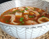 Foto del paso 8 de la receta: Calamares guisados con gambas y guisantes