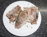 A picture of step 1 of Avocado Stuffed with Mackerel Salad.