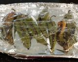A picture of step 4 of Crab and Shrimp Enchiladas with Hatch Chili Sauce.