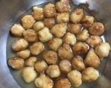 A picture of step 4 of Bengali Rosh Bora / Sweet Lentil Dumplings.