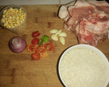 Foto del paso 1 de la receta: Arroz con chuleta de cerdo y maíz tierno