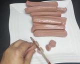 A picture of step 1 of Tum yum Sausages rice.