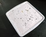 A picture of step 8 of No Bake Blueberry Biscuit Cake.