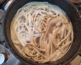 A picture of step 5 of Tagliolini with Truffle, Mushrooms, Peas, and Sausage.