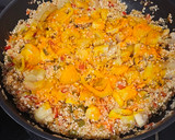 Foto del paso 5 de la receta: Arroz meloso de gambitas, calamares y pescadito