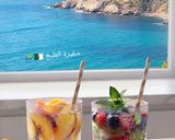 صورة لخطوة 1 من وصفة مشروب الخوخ🍑 بالماء غازي و سيروب