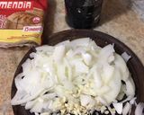 Foto del paso 1 de la receta: Empanadas de cebolla, tomate, queso y huevo