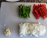 Foto del paso 4 de la receta: Chipirones en su tinta con arroz