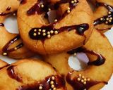 A picture of step 8 of Donuts.
