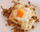 Foto del paso 4 de la receta: Tosta de Alcachofas fritas, Huevo roto y Jamón ibérico