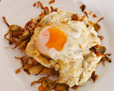 Foto del paso 4 de la receta: Tosta de Alcachofas fritas, Huevo roto y Jamón ibérico