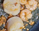 A picture of step 10 of Garlic Sautéed Scallop and Shrimp Pasta.