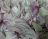 A picture of step 1 of Malai onion matar.