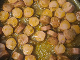 Salchichas en salsa con pimiento rojo
