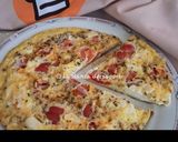 Foto del passaggio 7 della ricetta Frittata Aromatica con Datterini e Feta 🍅🍳🧀