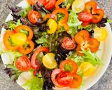 A picture of step 2 of Greek salad with shrimps.