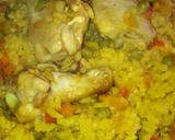 Foto del paso 9 de la receta: Paella con alitas de pollo y chorizo de sarta
