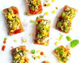 A picture of step 5 of Pizza toast with grilled corn salsa.