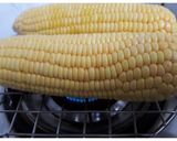 A picture of step 3 of Grilled Mexican Street Corn (Elote).