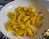 Foto del paso 2 de la receta: Mango flambeado con coco