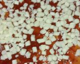 A picture of step 2 of Chicken cheese pizza.