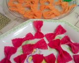 A picture of step 20 of Homemade farfalle pasta in three colour.