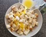 A picture of step 2 of Air Fryer Croutons.