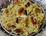 A picture of step 14 of Rakhi Special - Narali Bhat.