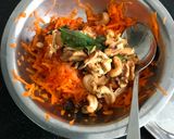 A picture of step 3 of Bombay walnut Carrot Salad with cashews.
