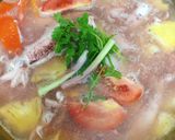 Hình bước làm 2 của món Canh Mực Nấu Ngót