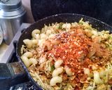 A picture of step 4 of Chicken veg macroni roll.