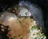 A picture of step 4 of Cheesy Kidney Beans Rice Stuffed Eggplant.
