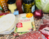 Foto del paso 2 de la receta: ¿Taco ? 🌮 ¿Burger? 🍔¿Sartén ? o ¿cecofry? 🧀 🥬 🧅 🥓 🫕
