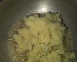 A picture of step 2 of Aloo ka halwa.