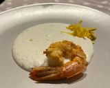 Foto del passaggio 4 della ricetta Crema di burrata al timo, zeste di limone e gamberone croccante all'arancia
