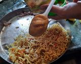 A picture of step 2 of Veg cheezy maggi franky.