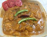 A picture of step 4 of Chicken 65 with gravy.