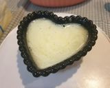 A picture of step 4 of Rich Cheesecake with Homemade Cookie Crust.