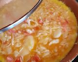 Foto del paso 2 de la receta Tortilla de patata con tomate natural y queso