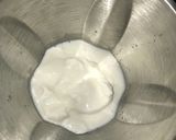 A picture of step 2 of Strawberry milkshake.